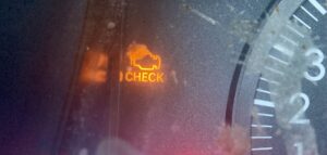 This is a photo of a "check engine" light on a 2005 Toyota Corolla. 